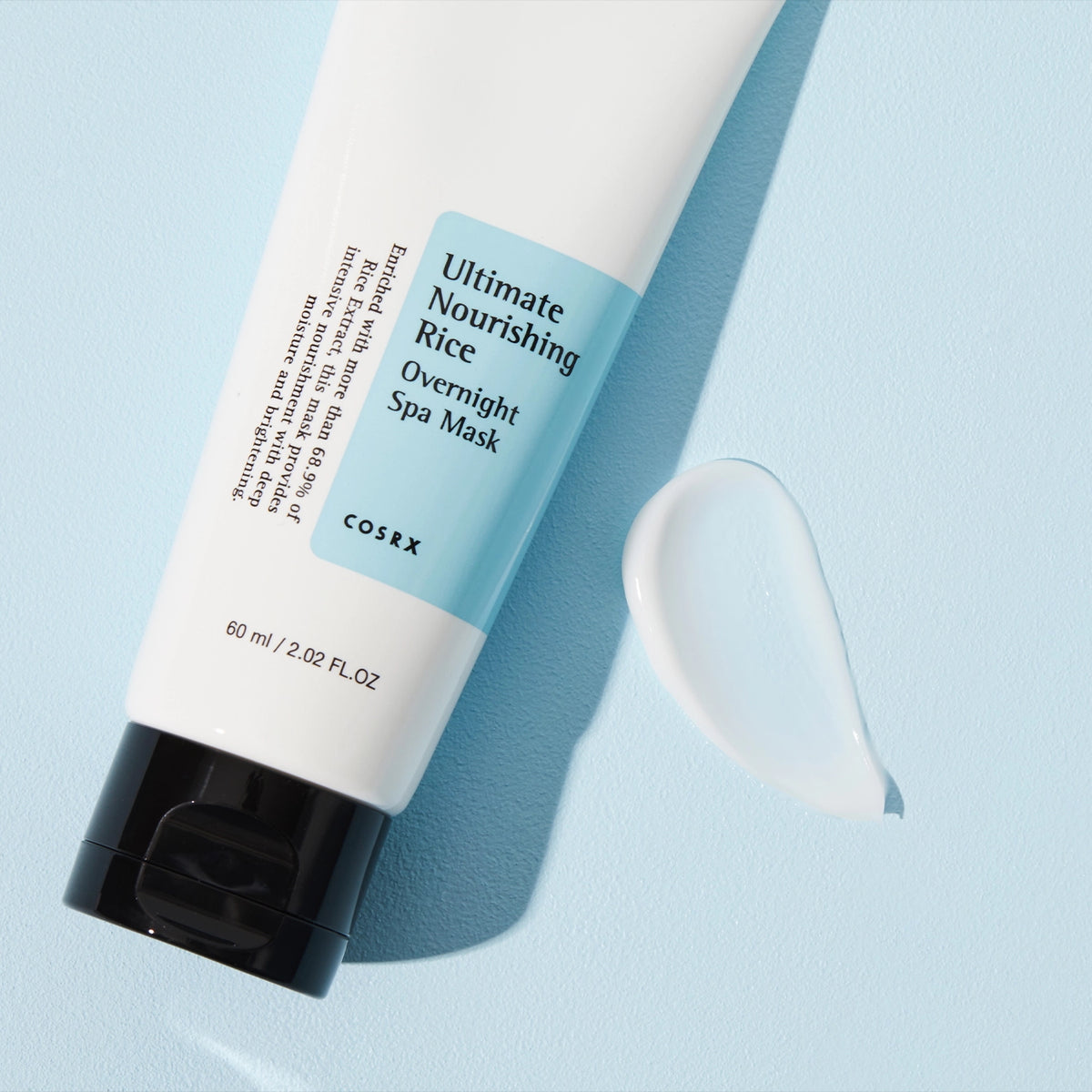 COSRX Ultimate Nourishing Rice Overnight Spa Mask op een lichte ondergrond