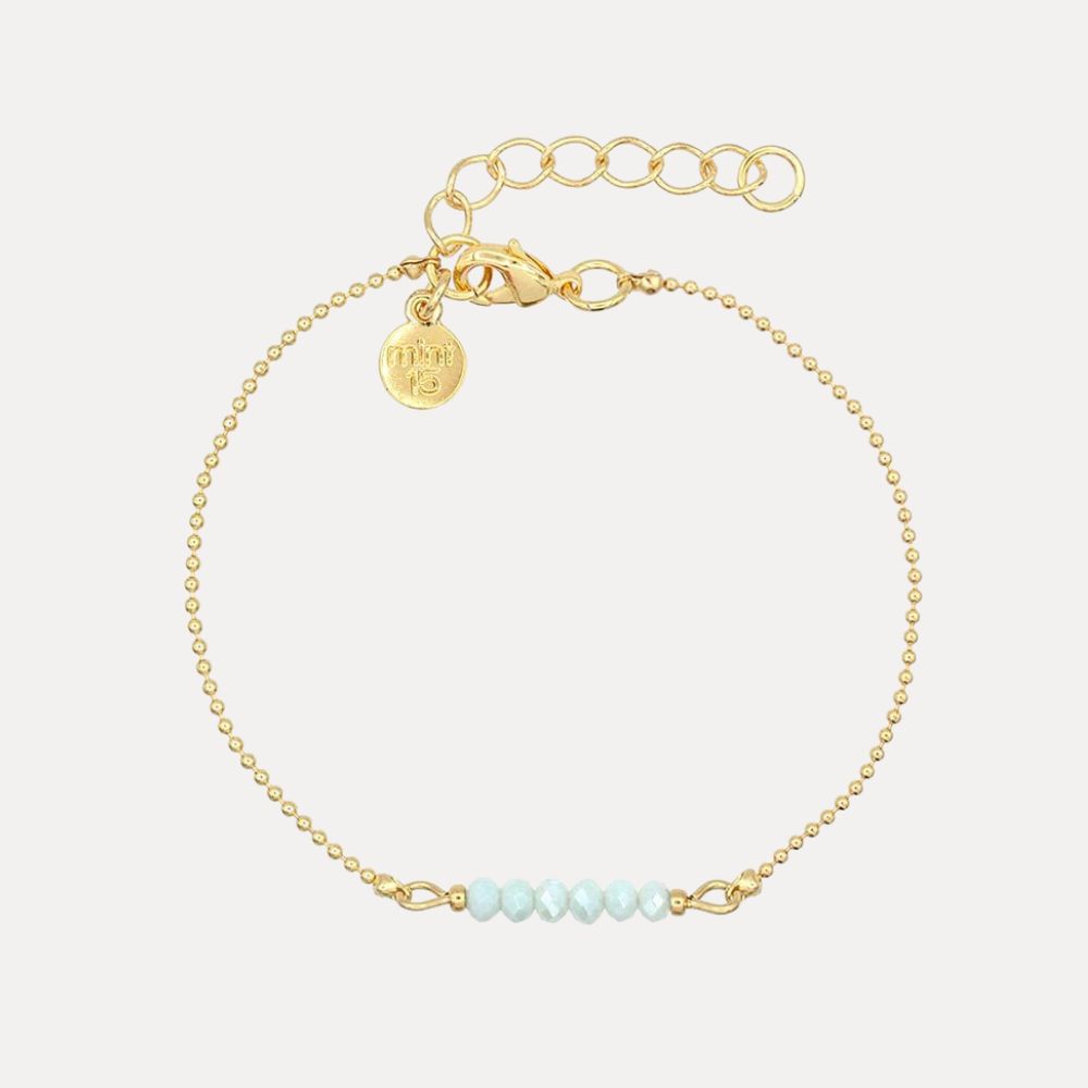 Gouden bolletjes armband blauwe kralen